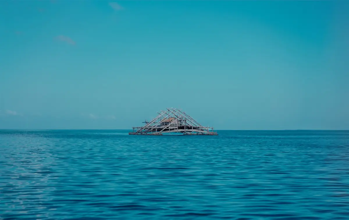 A traditional Indonesian phinisi under sail for private island hopping